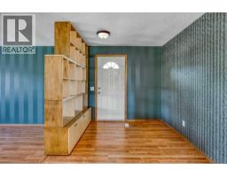 Foyer - 31 Riverside Place, Cochrane, AB T4C1J6 Photo 6