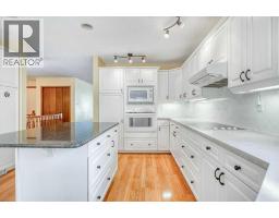 Family room - 31 Riverside Place, Cochrane, AB T4C1J6 Photo 12