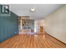Kitchen - 31 Riverside Place, Cochrane, AB T4C1J6 Photo 7