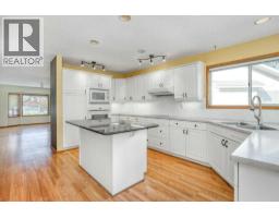 4pc Bathroom - 31 Riverside Place, Cochrane, AB T4C1J6 Photo 10