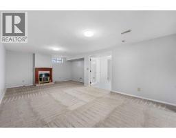 Living room - 479 Bracewood Crescent Sw, Calgary, AB T2W3B7 Photo 8