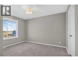 203, 315 Redstone  Ne, Calgary, AB T3N1M6 Photo 11