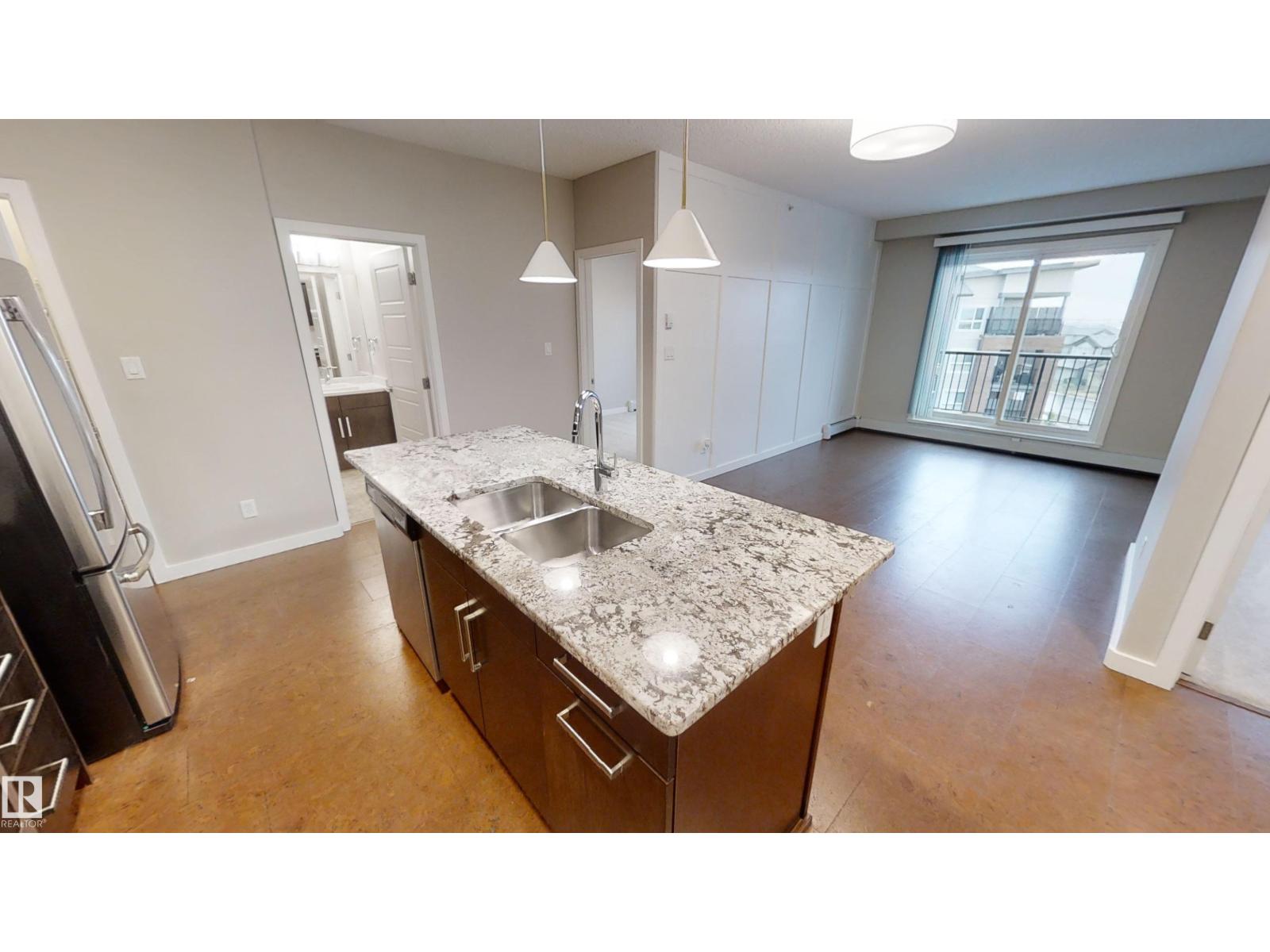#404 5510 Schonsee DR NW - 3