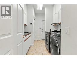 Laundry room - 51 Blueridge Close, Rural Rocky View County, AB T3L2P4 Photo 25