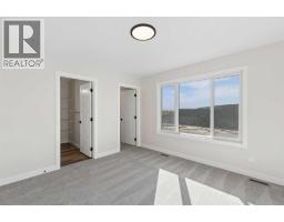52 Southborough Common, Cochrane, AB T4C3J7 Photo 21