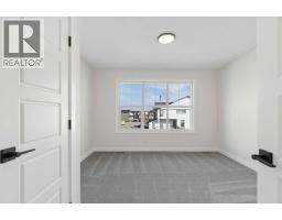 52 Southborough Common, Cochrane, AB T4C3J7 Photo 29