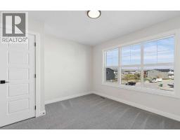 52 Southborough Common, Cochrane, AB T4C3J7 Photo 28