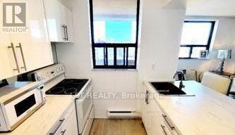 #701 105 MCCAUL STREET - 3
