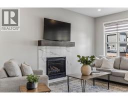 Laundry room - 264 Riviera Way, Cochrane, AB T4C0Z2 Photo 8