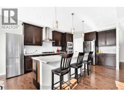 Dining room - 296 Nolancrest Heights Nw, Calgary, AB T3R0V8 Photo 9