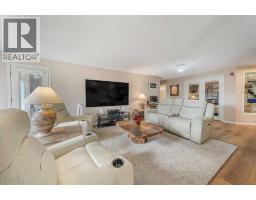 Sunroom - 222, 6868 Sierra Morena Boulevard Sw, Calgary, AB T3H3R6 Photo 10