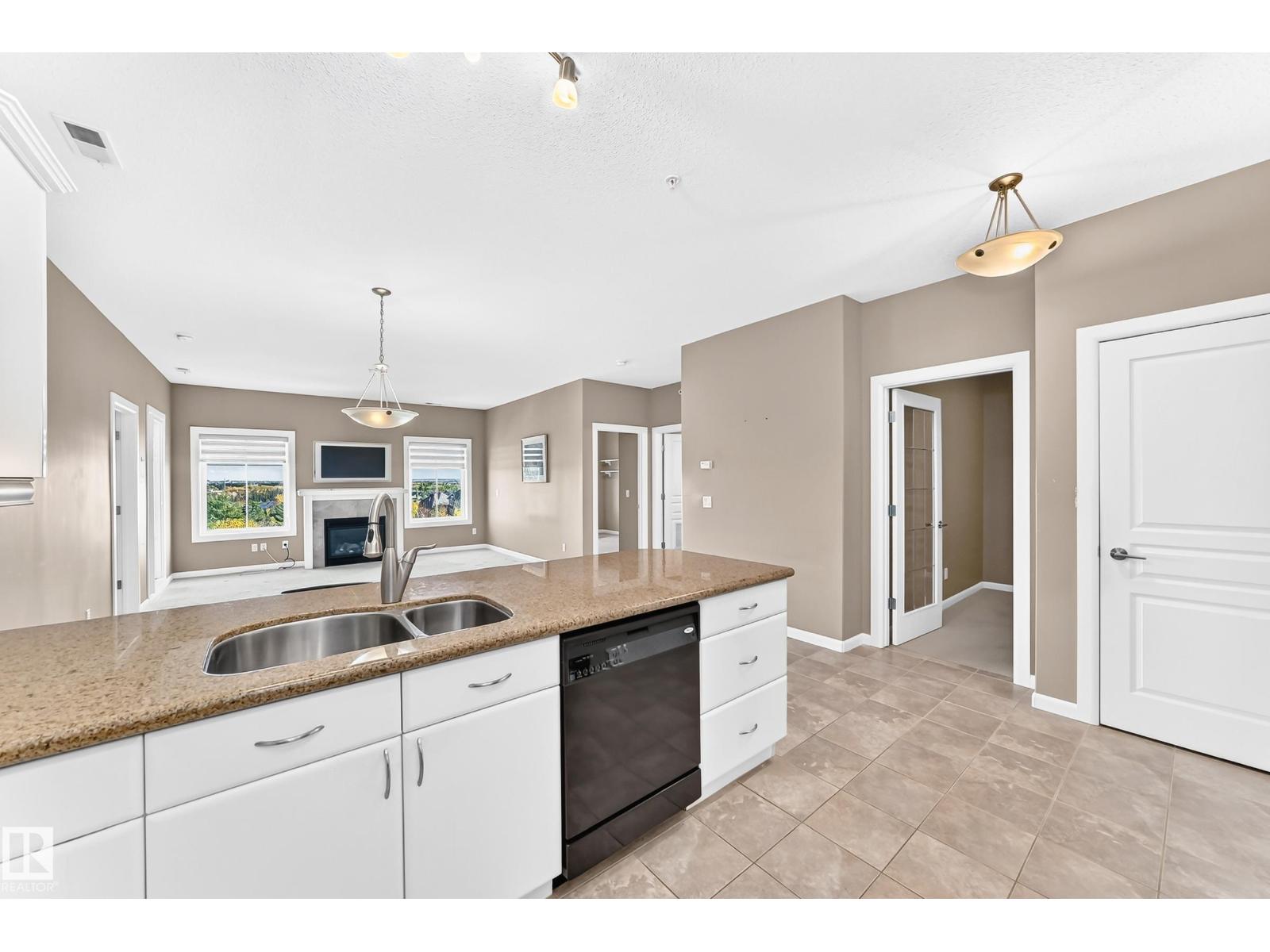 #436 160 MAGRATH RD NW - 7