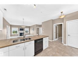 Laundry room - #436 160 Magrath Rd Nw, Edmonton, AB T6R3T7 Photo 7