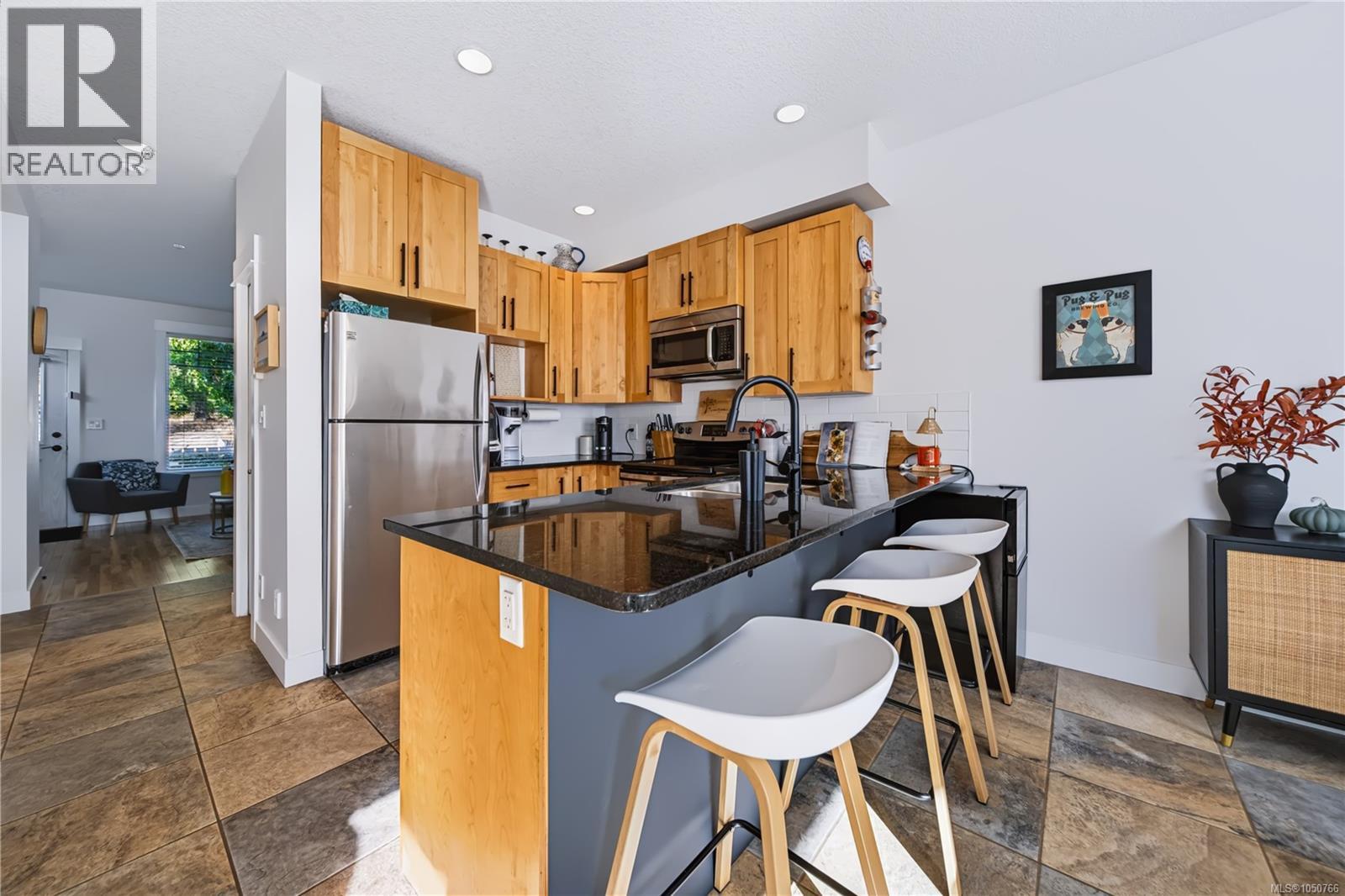 #102 6057 Doumont Rd - Image 3