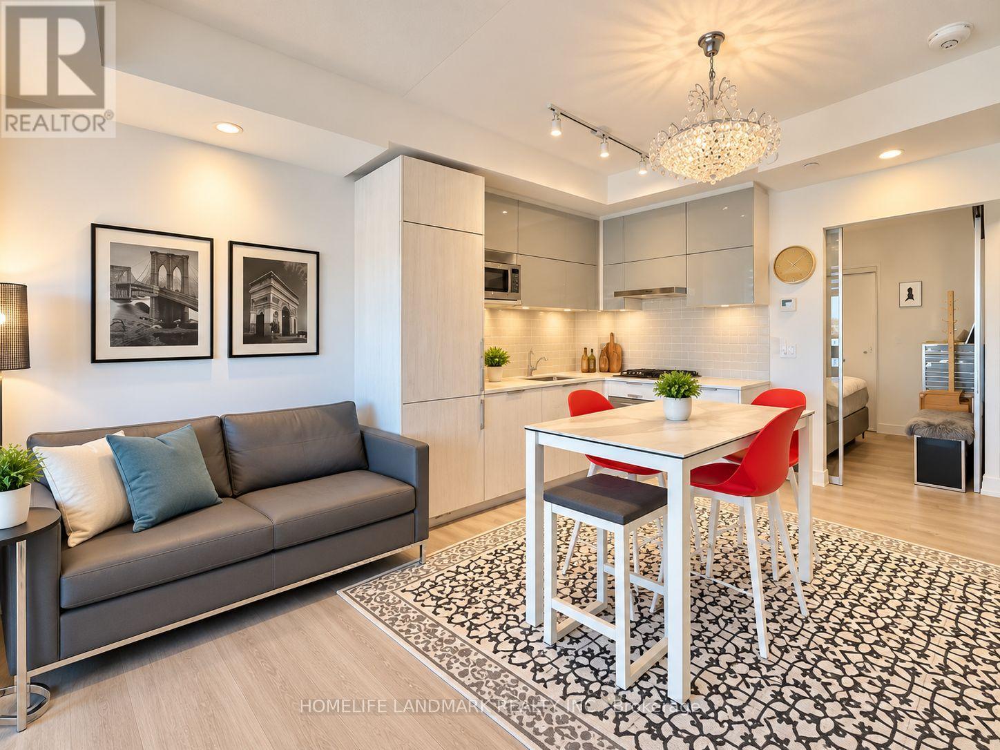 #1403A 10 ROUGE VALLEY DRIVE W - 12