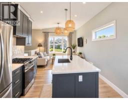 Family room - 670 Anderson Close Nw, Diamond Valley, AB T0L2A0 Photo 9