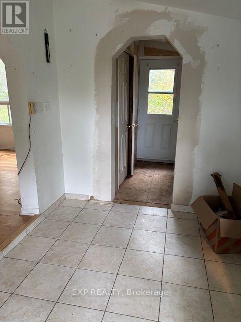 Front entry and hallway to backdoor