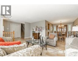 Family room - 122 Wakaw Crescent, Saskatoon, SK S7J4E2 Photo 6