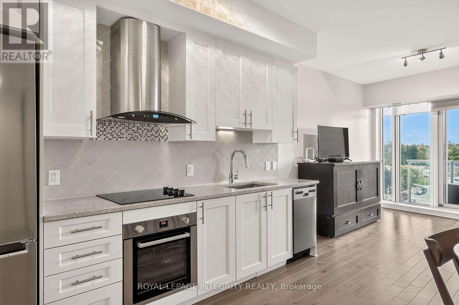 #703 805 CARLING AVENUE - 19