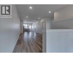 Great room - 10 Memorial Parkway, Rural Red Deer County, AB T4E3B7 Photo 7