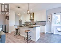 Family room - 38 Beverly Street, Springwater, ON L0L1P0 Photo 11