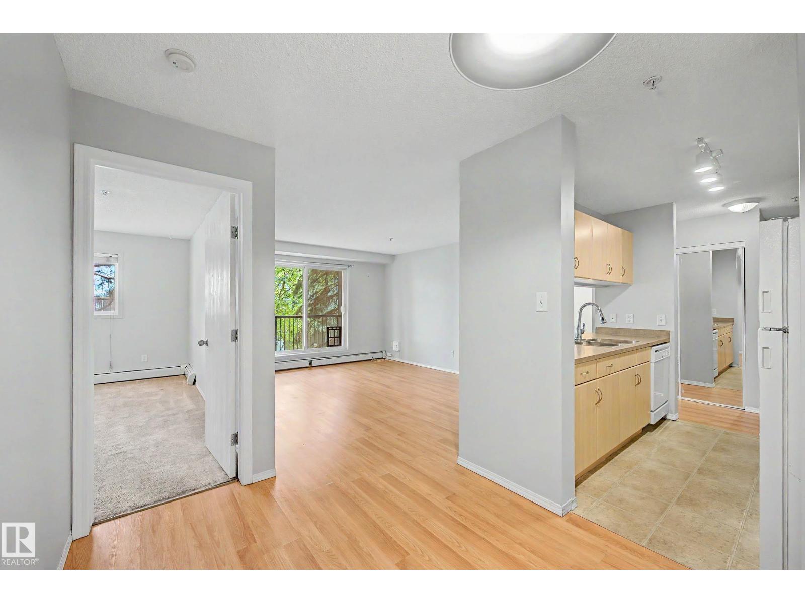 #204 2430 GUARDIAN RD NW - 11