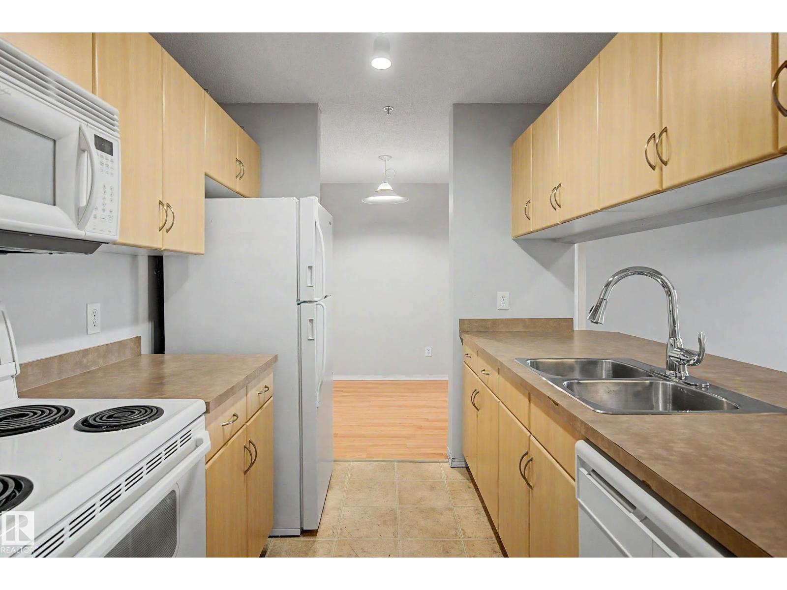 #204 2430 GUARDIAN RD NW - Image 4