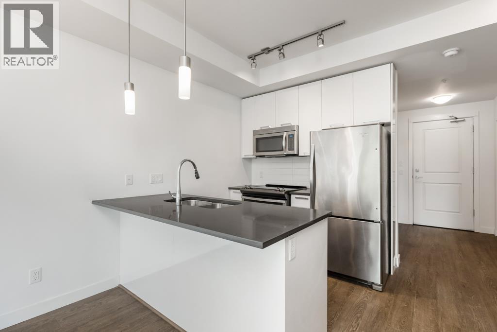 210 6533 MCKAY AVENUE, Burnaby - Image 1
