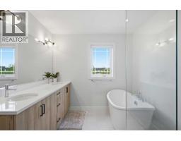 1062 Harmony Parade, Rural Rocky View County, AB T3Z0H1 Photo 31