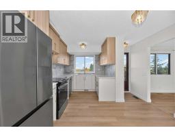 Primary Bedroom - 63 Beaconsfield Crescent Nw, Calgary, AB T3K1W5 Photo 8