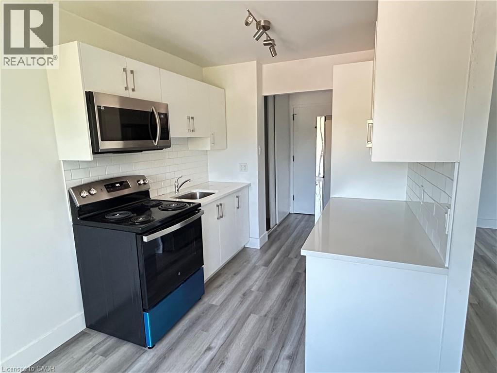 54 COUNTRY HILL Drive Unit# 318, Kitchener — photo 4