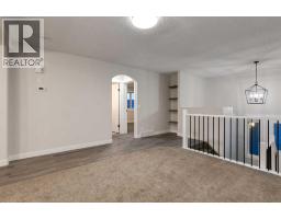 Family room - 164 Sunset Heights, Crossfield, AB T0M0S0 Photo 9