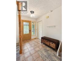 Laundry room - 94 Redwood Meadows Drive, Rural Rocky View County, AB T3Z1A3 Photo 8