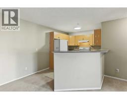 Kitchen - 1310, 16320 24 Street Sw, Calgary, AB T2Y4T7 Photo 7