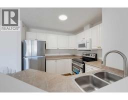 Kitchen - 416, 6000 Somervale Court Sw, Calgary, AB T2Y4J4 Photo 6