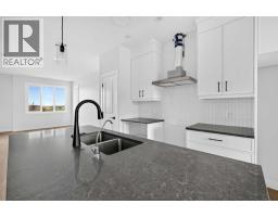 Laundry room - 255 Lucas Gate Nw, Calgary, AB T3P2S5 Photo 10