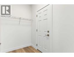 Laundry room - 138 Silver Spruce Road Sw, Calgary, AB T2X6L3 Photo 14