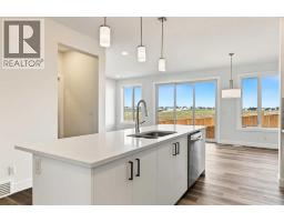 Family room - 138 Silver Spruce Road Sw, Calgary, AB T2X6L3 Photo 6