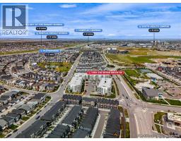 Laundry room - 1202, 220 Seton Grove Se, Calgary, AB T3M3T1 Photo 7