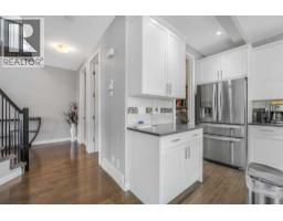 Hall - 134 Kinniburgh Lane, Chestermere, AB T1X0V1 Photo 9