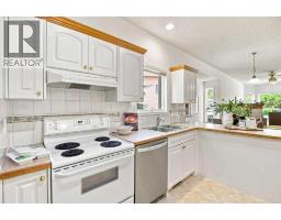 Family room - 21 Scimitar Heath Nw, Calgary, AB T3L2E1 Photo 8