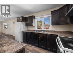 Living room - 211 31st Street E, Prince Albert, SK S6V8A8 Photo 9