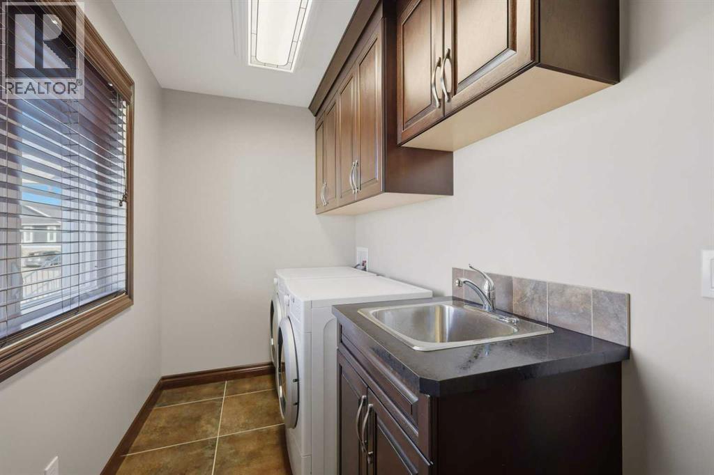 Convenient main-floor laundry keeps everyday chores close at hand