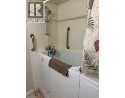 8412, 304 Mackenzie Way Sw, Airdrie, AB T4B3H7 Photo 6
