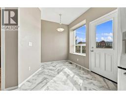 303, 2005 Luxstone Boulevard SW - photo 5