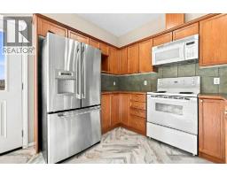 303, 2005 Luxstone Boulevard SW - photo 8