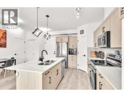 305, 30 Sage Hill  NW - photo 4