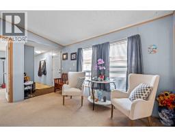 Bedroom - 402, 1101 84 Street Ne, Calgary, AB T2A7X2 Photo 6