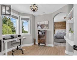 Family room - 100, 354016 64 Street E, Rural Foothills County, AB T1S1B5 Photo 11
