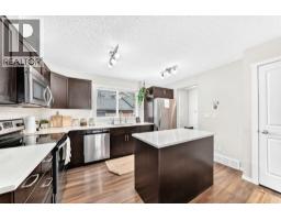 Living room - 41 Sunvalley Road, Cochrane, AB T4C0H4 Photo 6